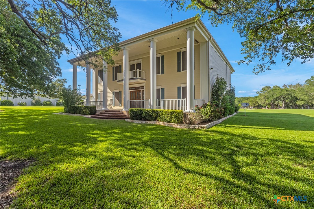 10299 Paddy Hamilton Road Belton, TX 76513 - Photo 11 of 46 a view of a house with a yard