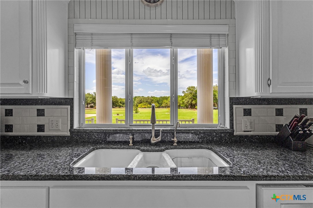 10299 Paddy Hamilton Road Belton, TX 76513 - Photo 19 of 46 a kitchen with sink and window