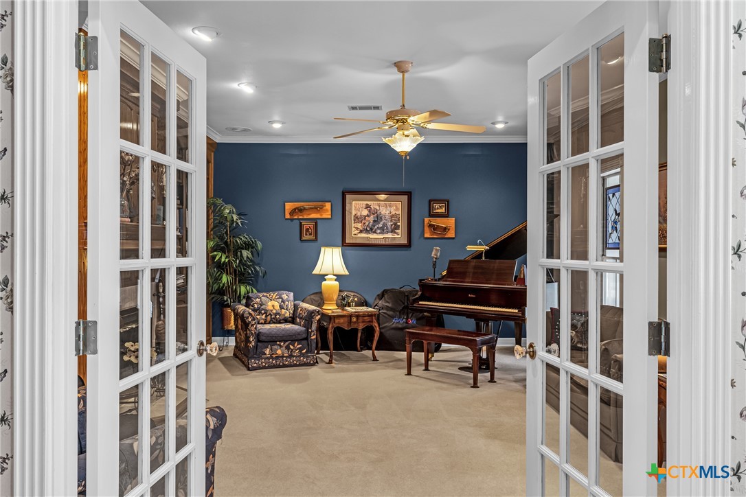 10299 Paddy Hamilton Road Belton, TX 76513 - Photo 26 of 46 a view of a livingroom with furniture and staircase