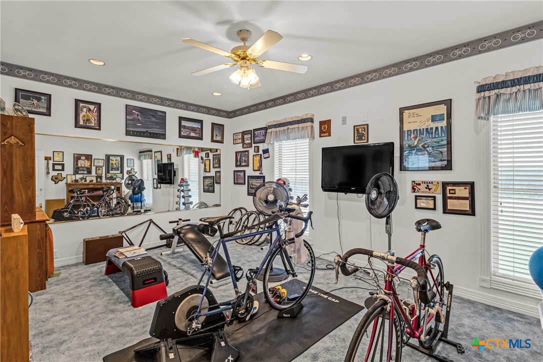 10299 Paddy Hamilton Road Belton, TX 76513 - Photo 39 of 46 a view of a livingroom with furniture and a flat screen tv