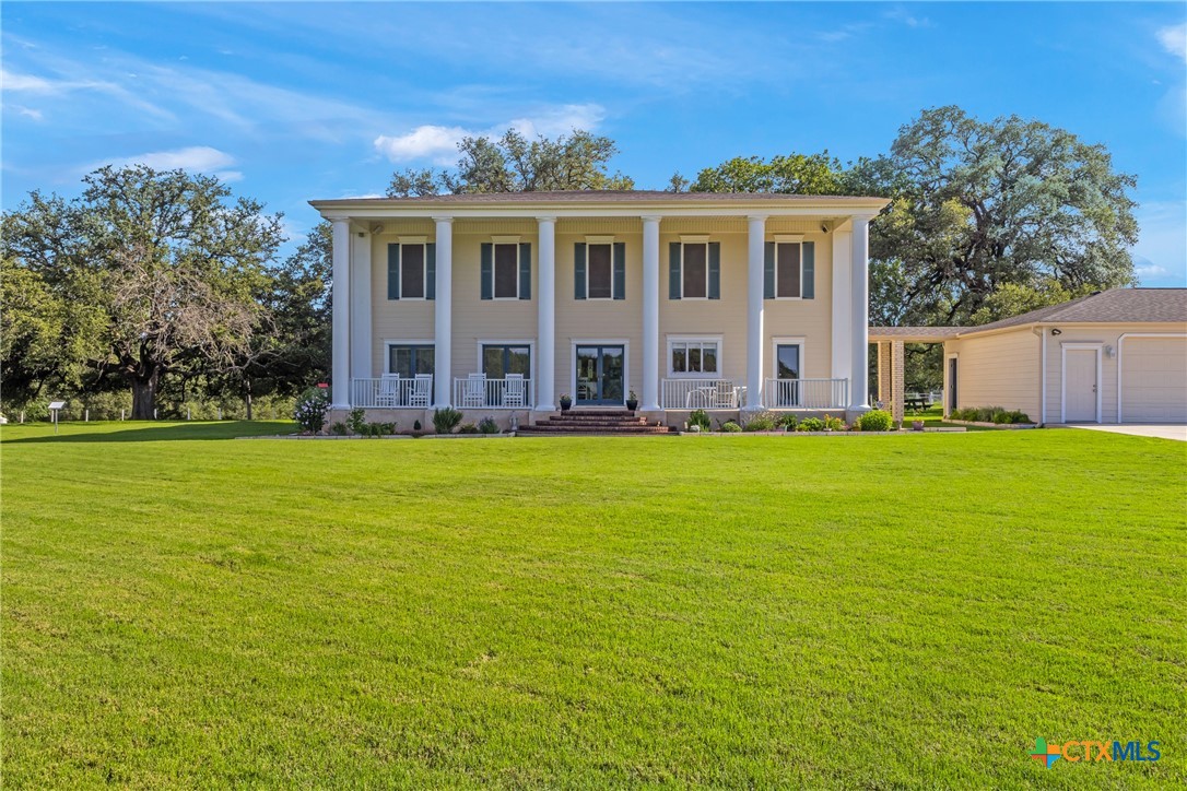 10299 Paddy Hamilton Road Belton, TX 76513 - Photo 4 of 46 a front view of house with yard and green space