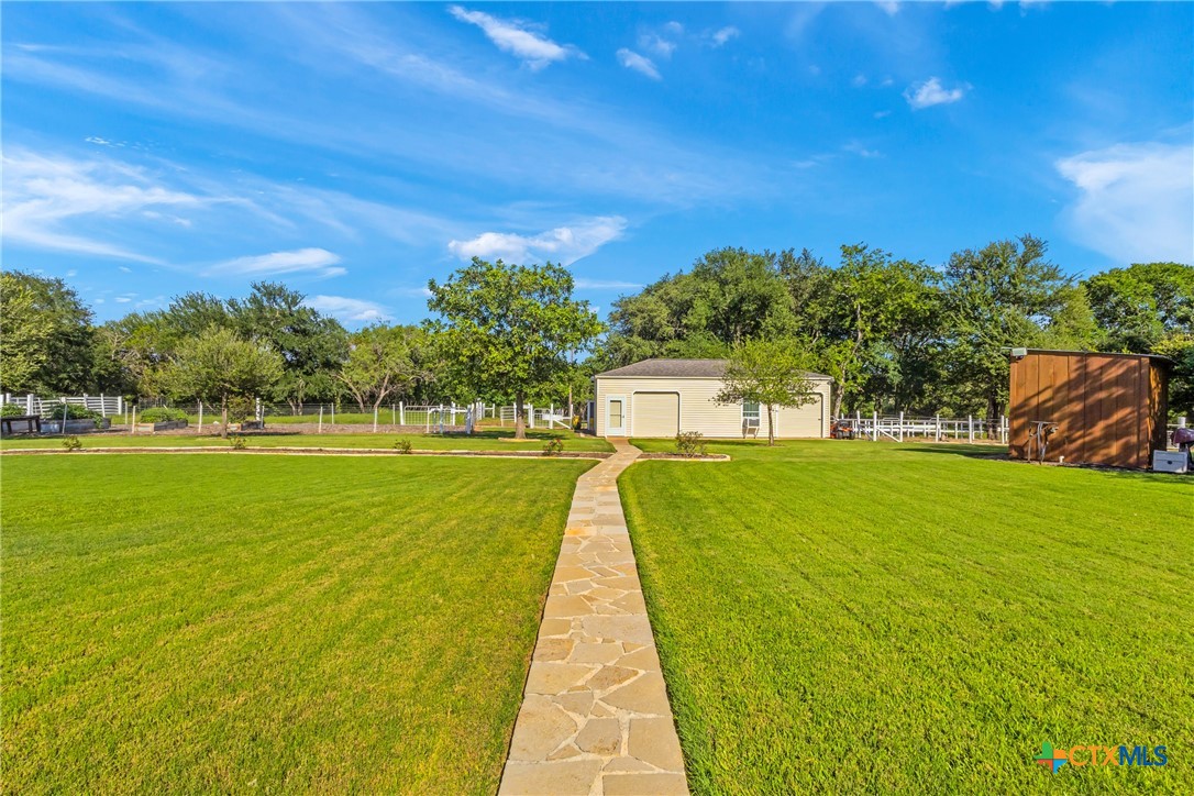 10299 Paddy Hamilton Road Belton, TX 76513 - Photo 41 of 46 a view of a swimming pool with a yard