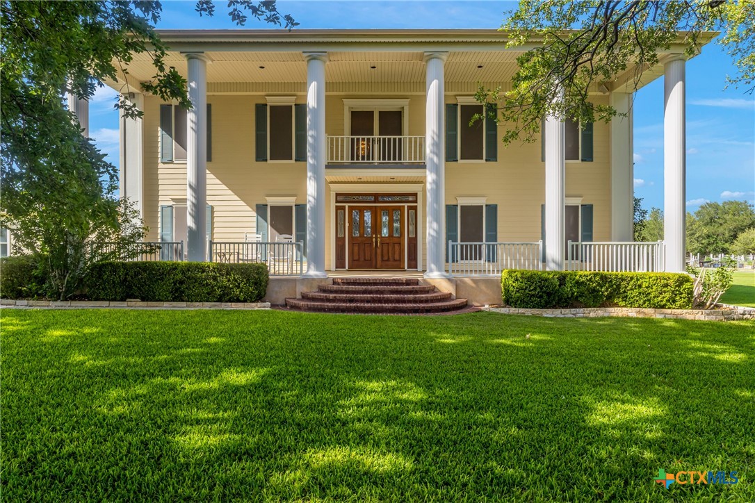 10299 Paddy Hamilton Road Belton, TX 76513 - Photo 10 of 46 a view of a house with a garden and pathway