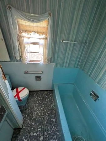 a bathroom with a bathtub