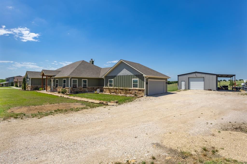 14910 Old Stoney Road Ponder, TX 76259 - Photo 3 of 36 a front view of house with yard