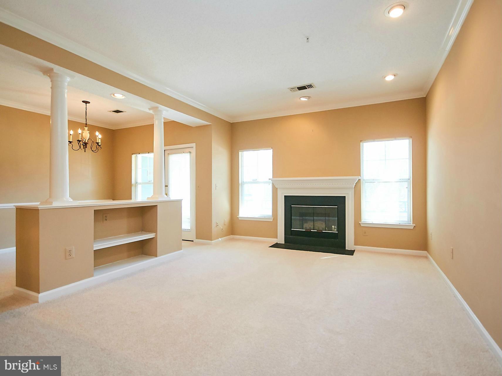 12024 Taliesin Place, Unit 12 Reston, VA 20190 - Photo 3 of 28 Living Room with Gas Fireplace