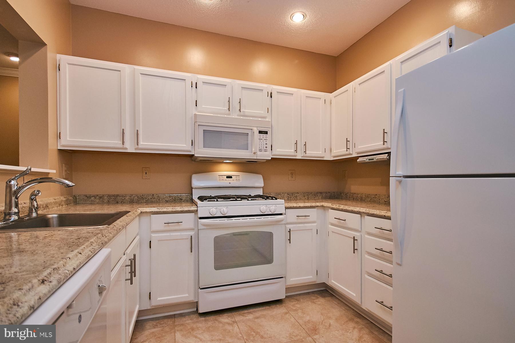 12024 Taliesin Place, Unit 12 Reston, VA 20190 - Photo 7 of 28 Updated Kitchen