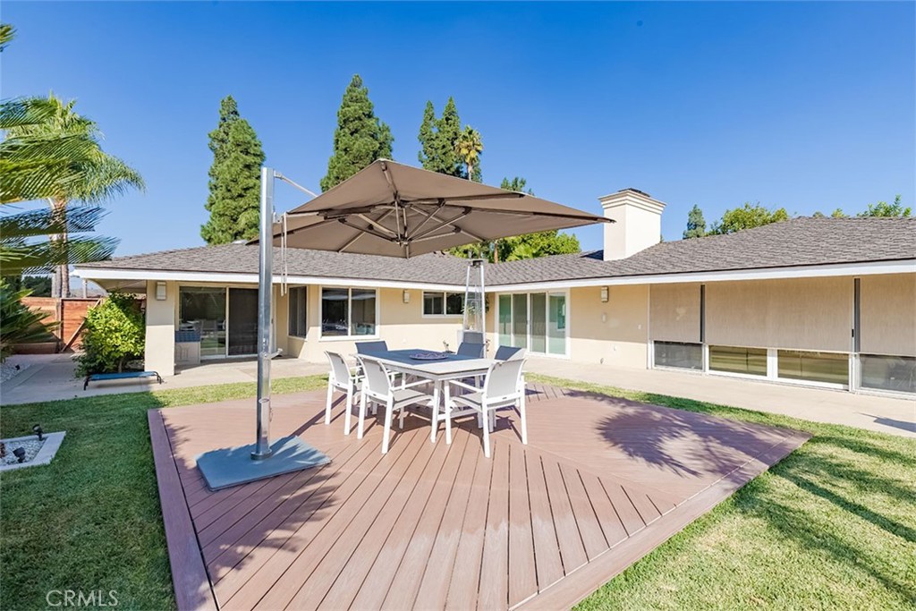 931 Rancho Circle Fullerton, CA 92835 - Photo 15 of 53 a view of a house with backyard sitting area and garden