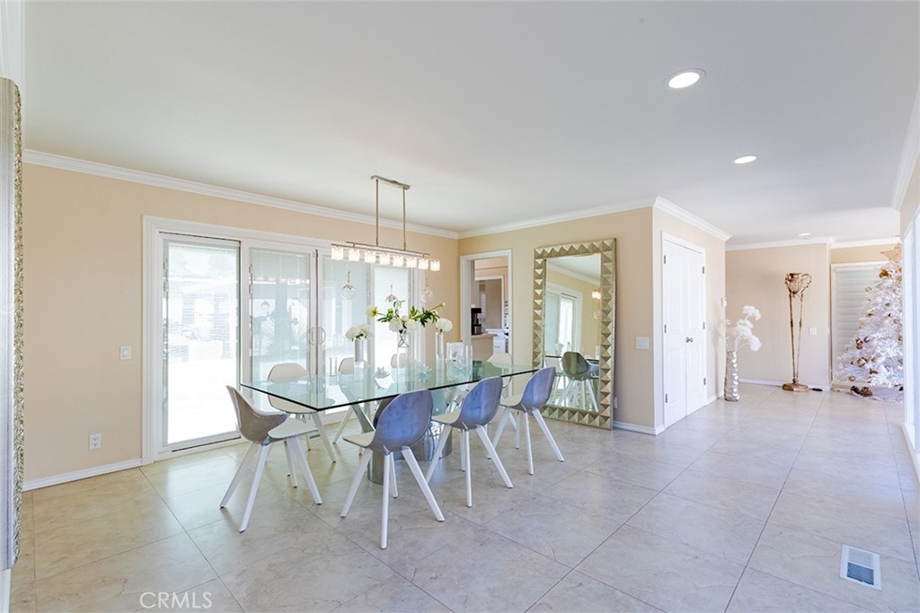 931 Rancho Circle Fullerton, CA 92835 - Photo 24 of 53 a view of a dining room with furniture and chandelier
