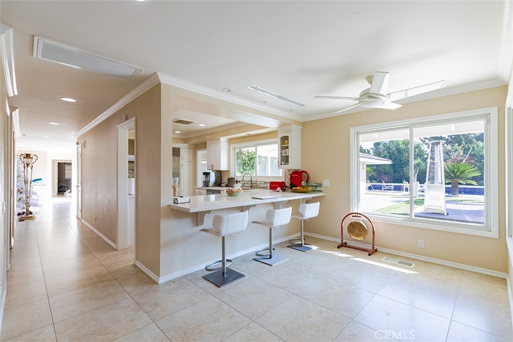931 Rancho Circle Fullerton, CA 92835 - Photo 29 of 53 a view of a hallway with dining table and chairs