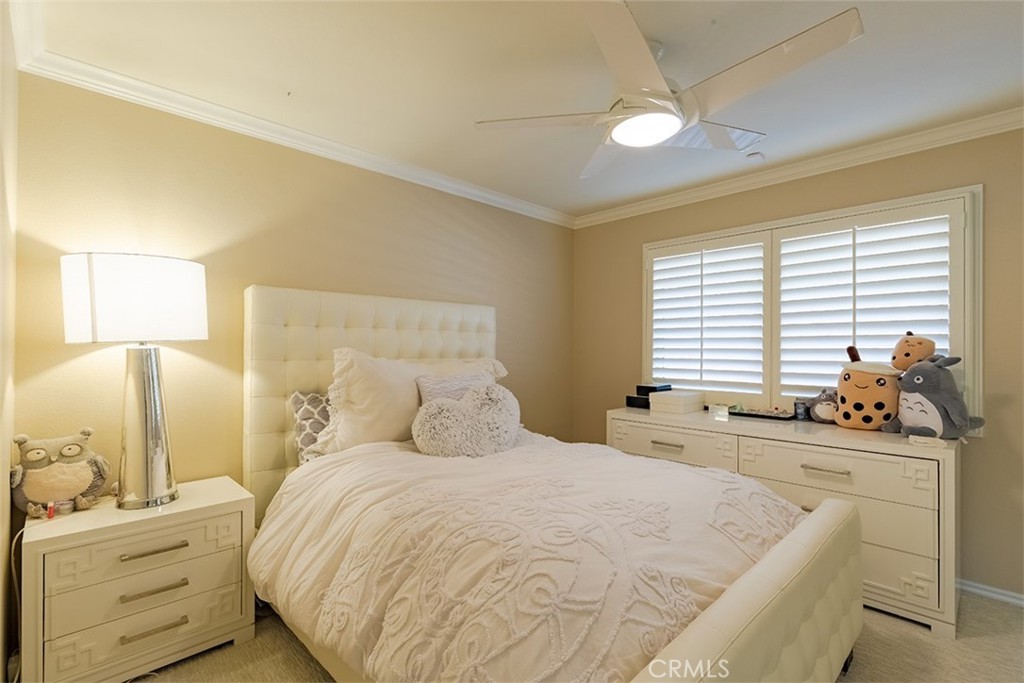 931 Rancho Circle Fullerton, CA 92835 - Photo 45 of 53 a bedroom with a bed and a window