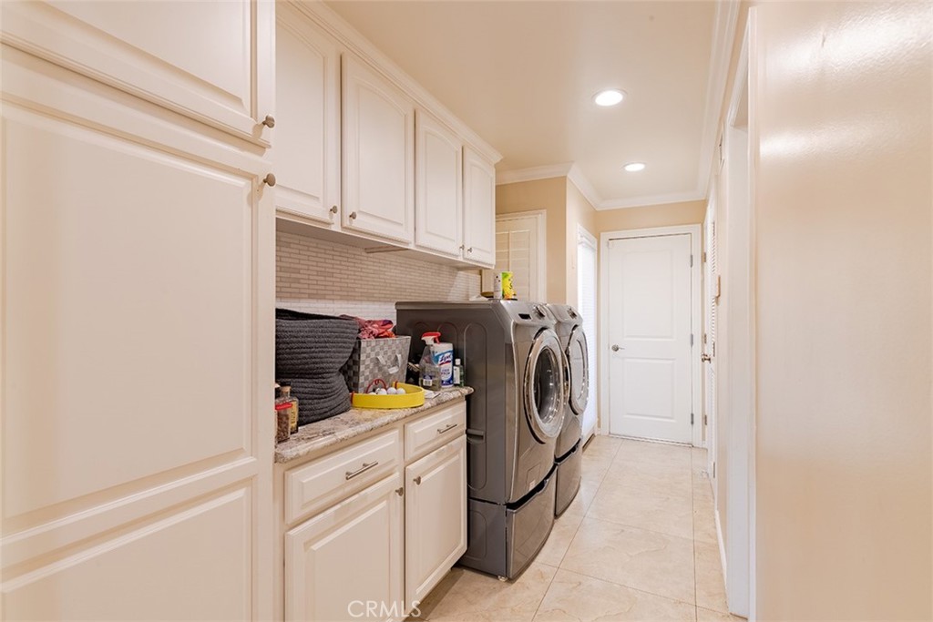 931 Rancho Circle Fullerton, CA 92835 - Photo 53 of 53 a storage room with washer and dryer