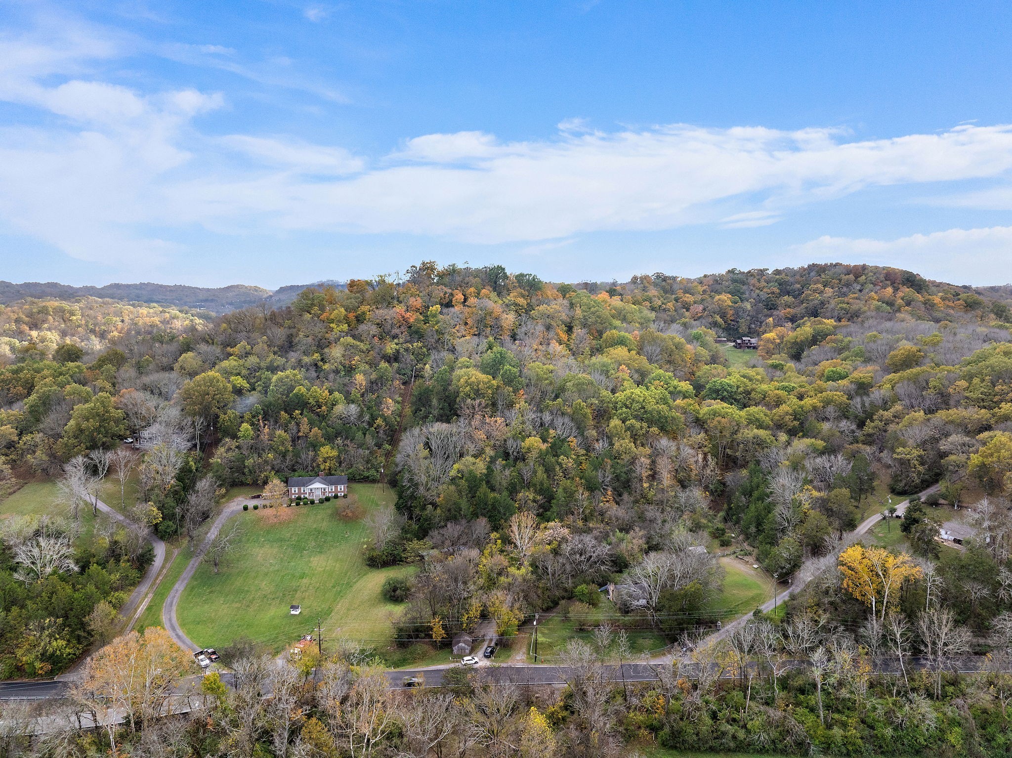 6916 River Rd Pike Nashville, TN 37209 - Photo 17 of 24 an aerial view of a houses with a yard