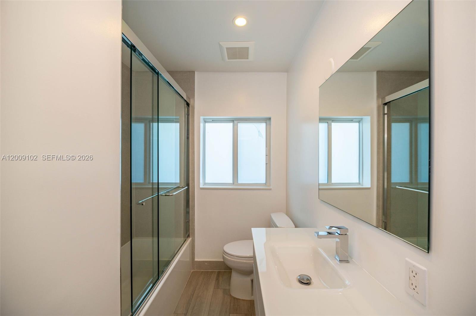 330 Southwest 27th Road Miami, FL 33129 - Photo 26 of 62 a bathroom with a bathtub and a sink