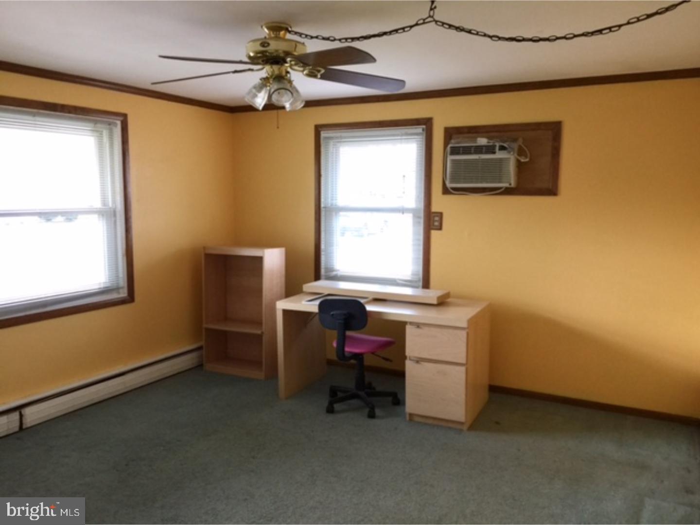 18 Tempo Road Levittown, PA 19056 - Photo 19 of 22 a room with a desk and a window