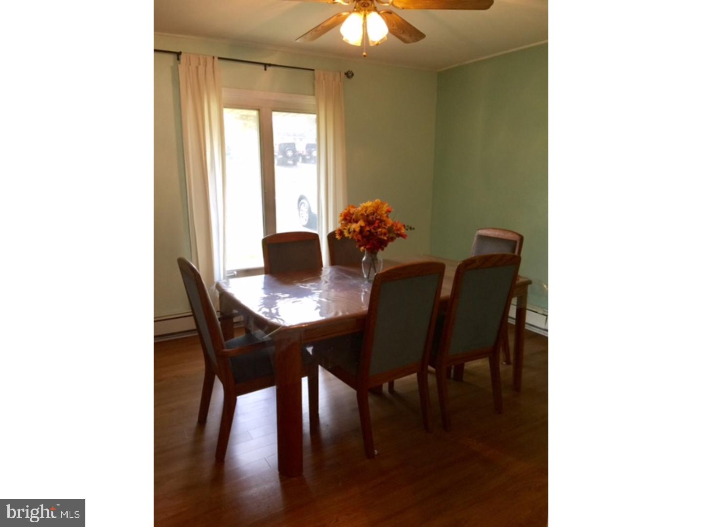 18 Tempo Road Levittown, PA 19056 - Photo 22 of 22 a view of a dining room with furniture and window