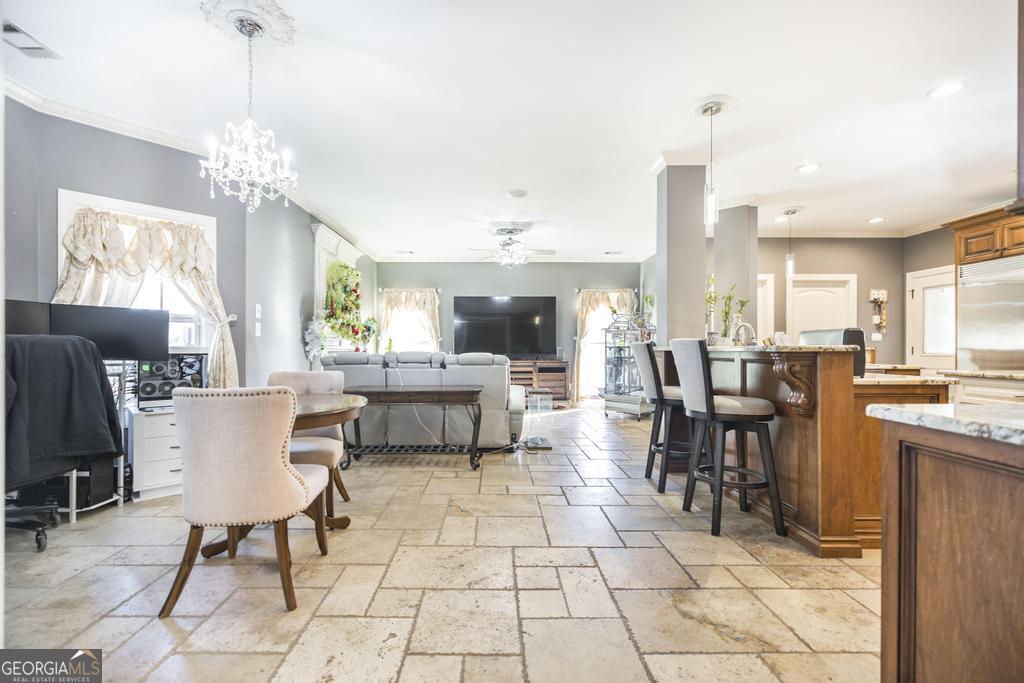 4065 Gordon Road Abbeville, GA 31001 - Photo 11 of 48 a view of a dining room with furniture