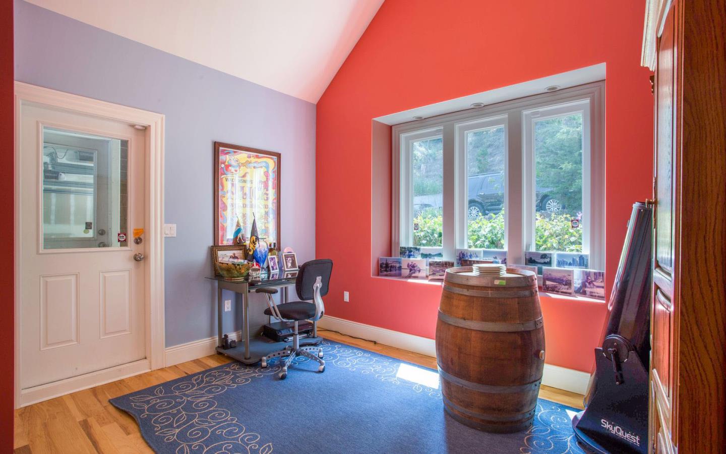 477 Clarendon Road Pacifica, CA 94044 - Photo 6 of 22 a living room with furniture and floor to ceiling windows