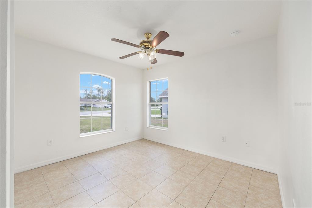15434 Southwest 23rd Court Road Ocala, FL 34473 - Photo 30 of 41 a view of an empty room with a window