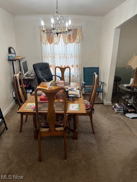 16319 Greyton Road Cleveland, OH 44112 - Photo 15 of 20 Dining room featuring a chandelier, carpet, a desk, ornamental molding, and baseboards