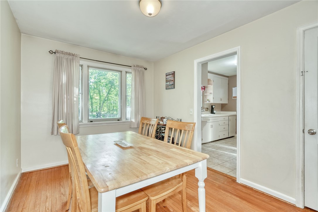 606 Bay Road Webster, NY 14580 - Photo 10 of 49 Dining area with hardwood floors