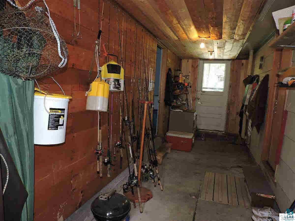 23214 Clam Lake Road Clam Lake, WI 54517 - Photo 11 of 19 Breezeway and storage between cabins.