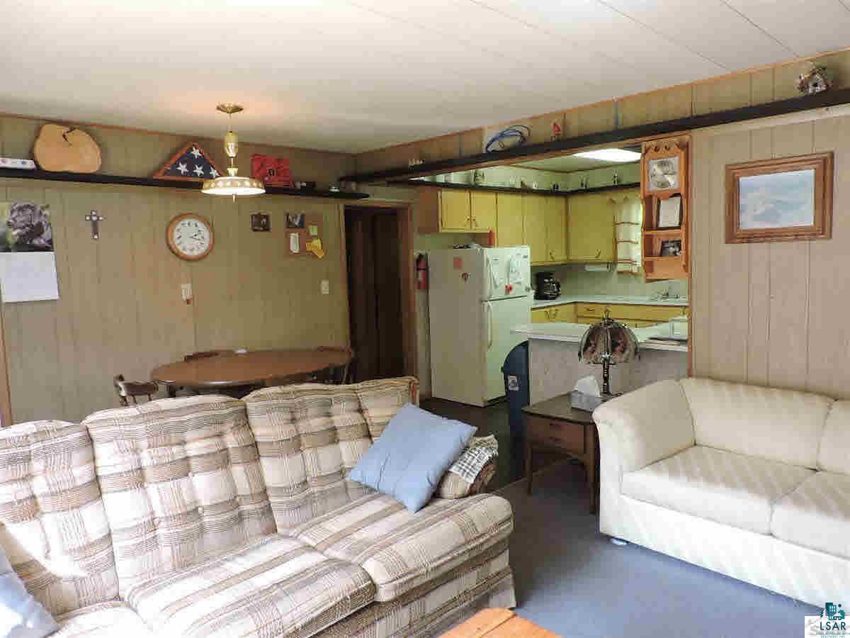 23214 Clam Lake Road Clam Lake, WI 54517 - Photo 2 of 19 Main cabin living room.