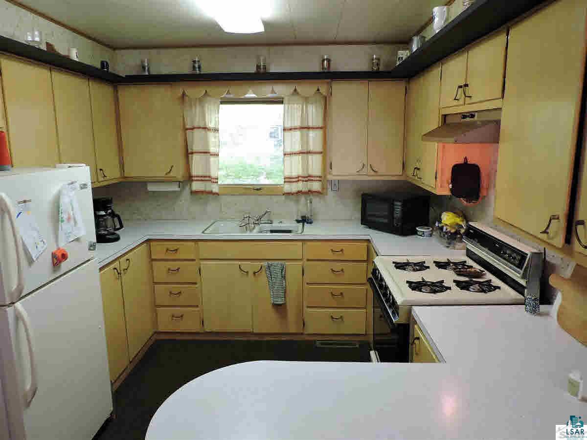 23214 Clam Lake Road Clam Lake, WI 54517 - Photo 3 of 19 Main cabin kitchen.