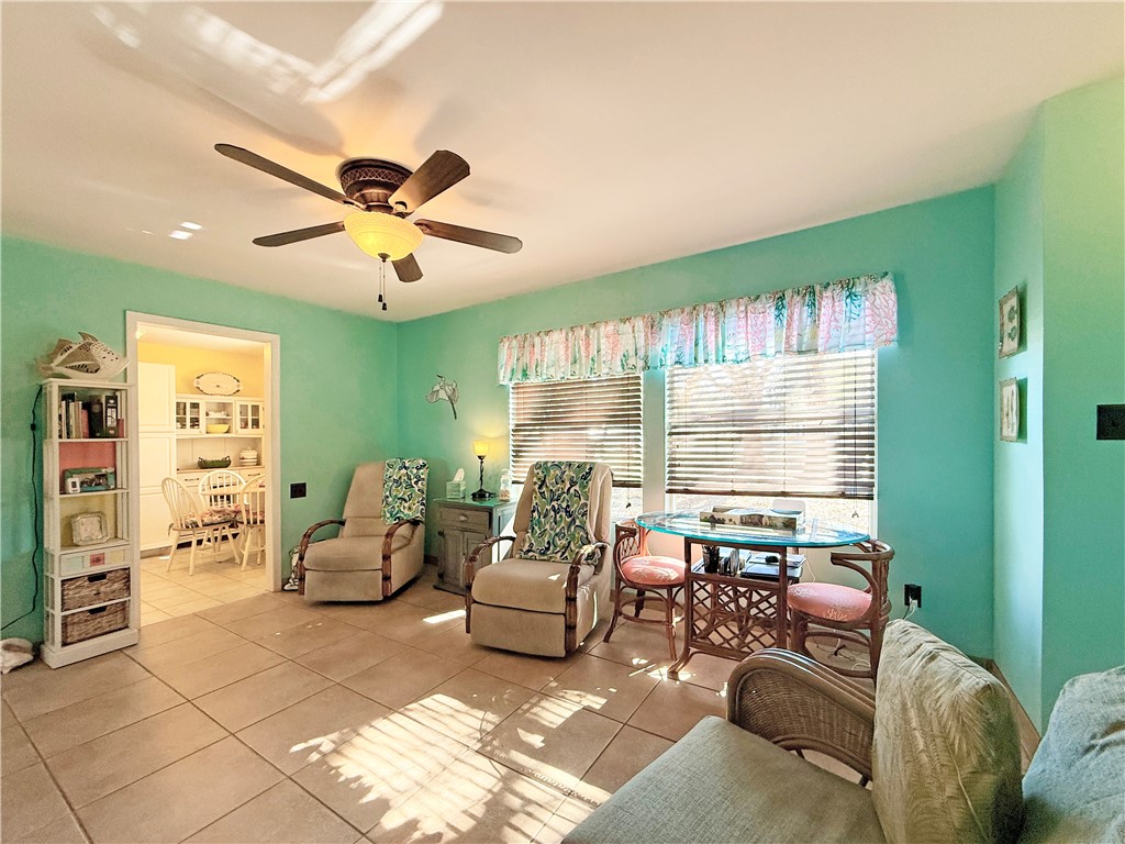 1411 Myrtle Street Fulton, TX 78358 - Photo 14 of 26 a living room with furniture and a large window