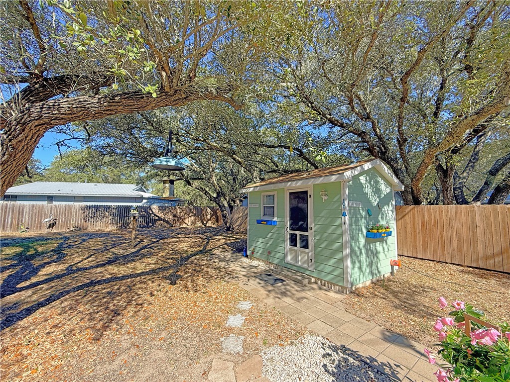 1411 Myrtle Street Fulton, TX 78358 - Photo 23 of 26 a view of a house with a yard