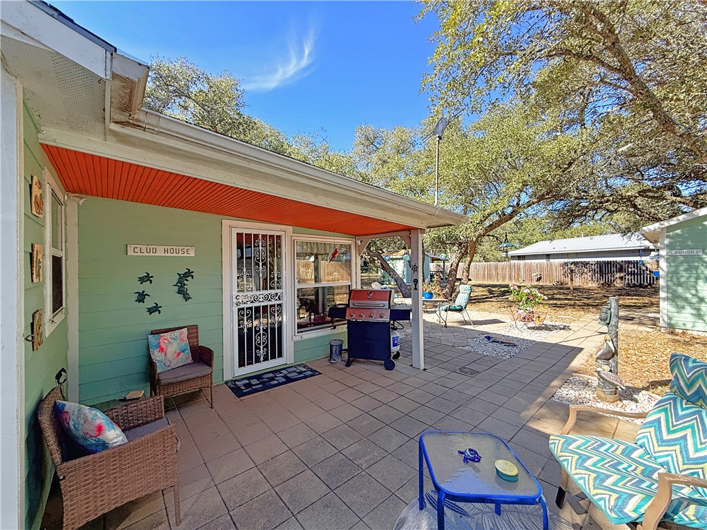 1411 Myrtle Street Fulton, TX 78358 - Photo 4 of 26 a view of living room kitchen with stainless steel appliances