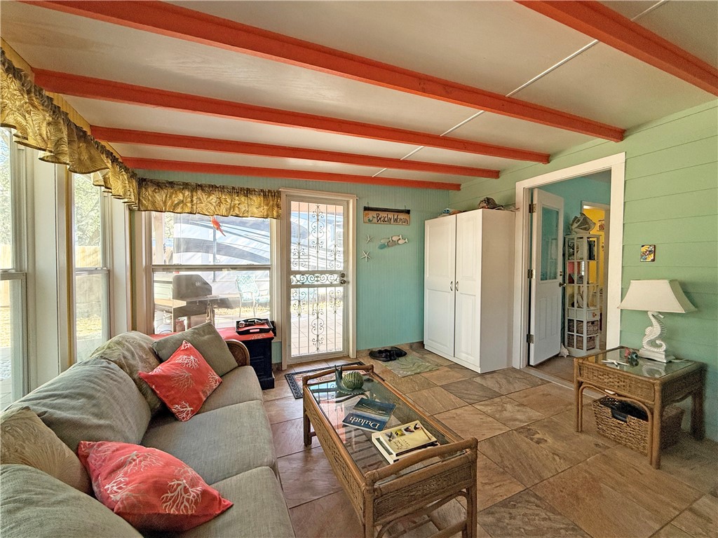 1411 Myrtle Street Fulton, TX 78358 - Photo 8 of 26 a living room with furniture and a window
