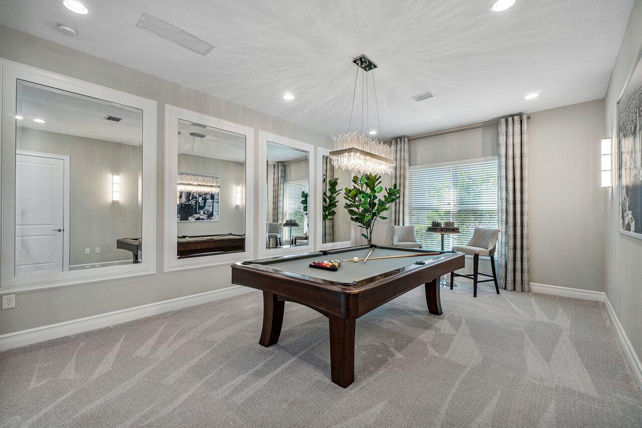 11655 Windy Frst Way Boca Raton, FL 33498 - Photo 30 of 50 a room with furniture pool table and wooden floor