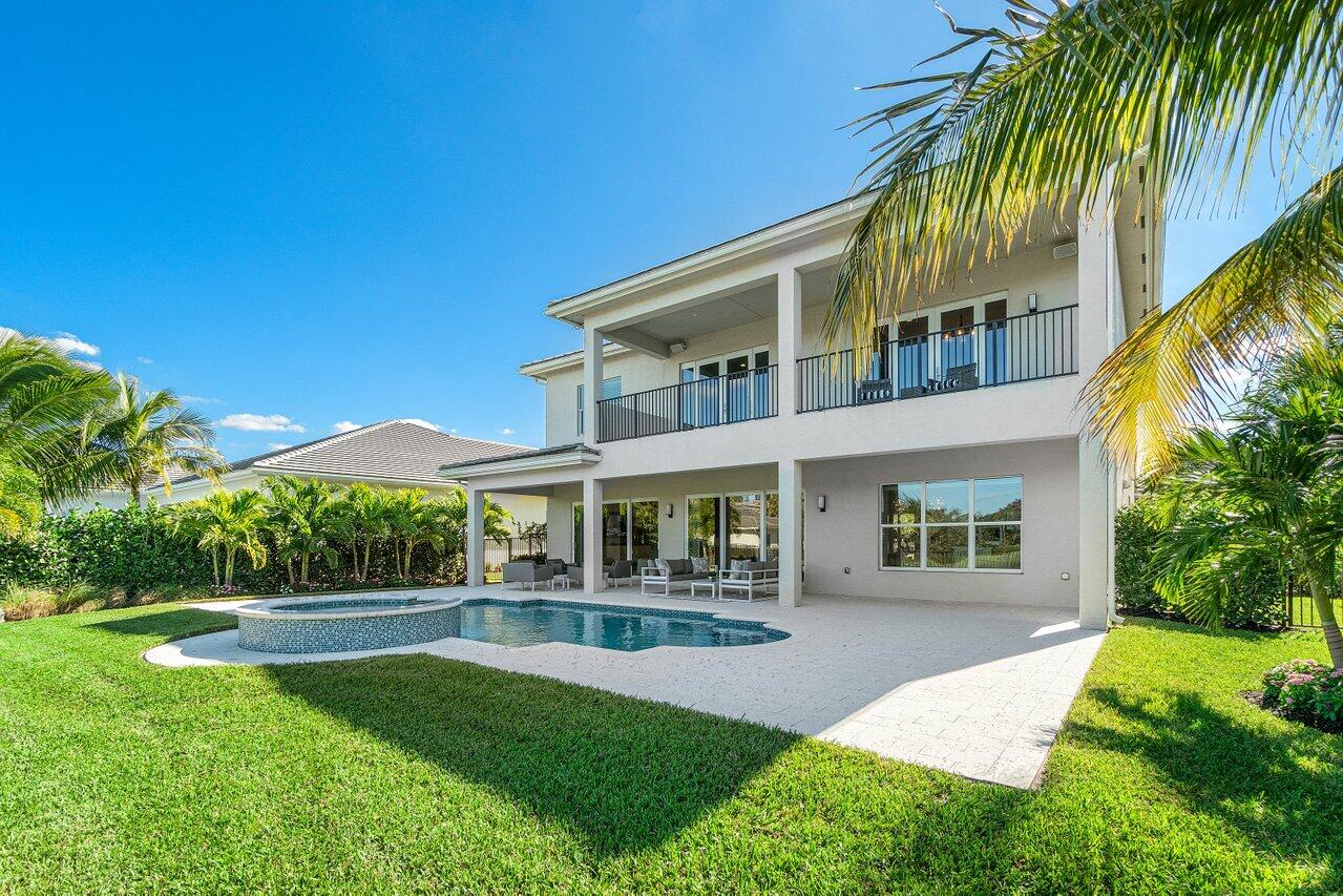 11655 Windy Frst Way Boca Raton, FL 33498 - Photo 38 of 50 a front view of a house with yard and green space