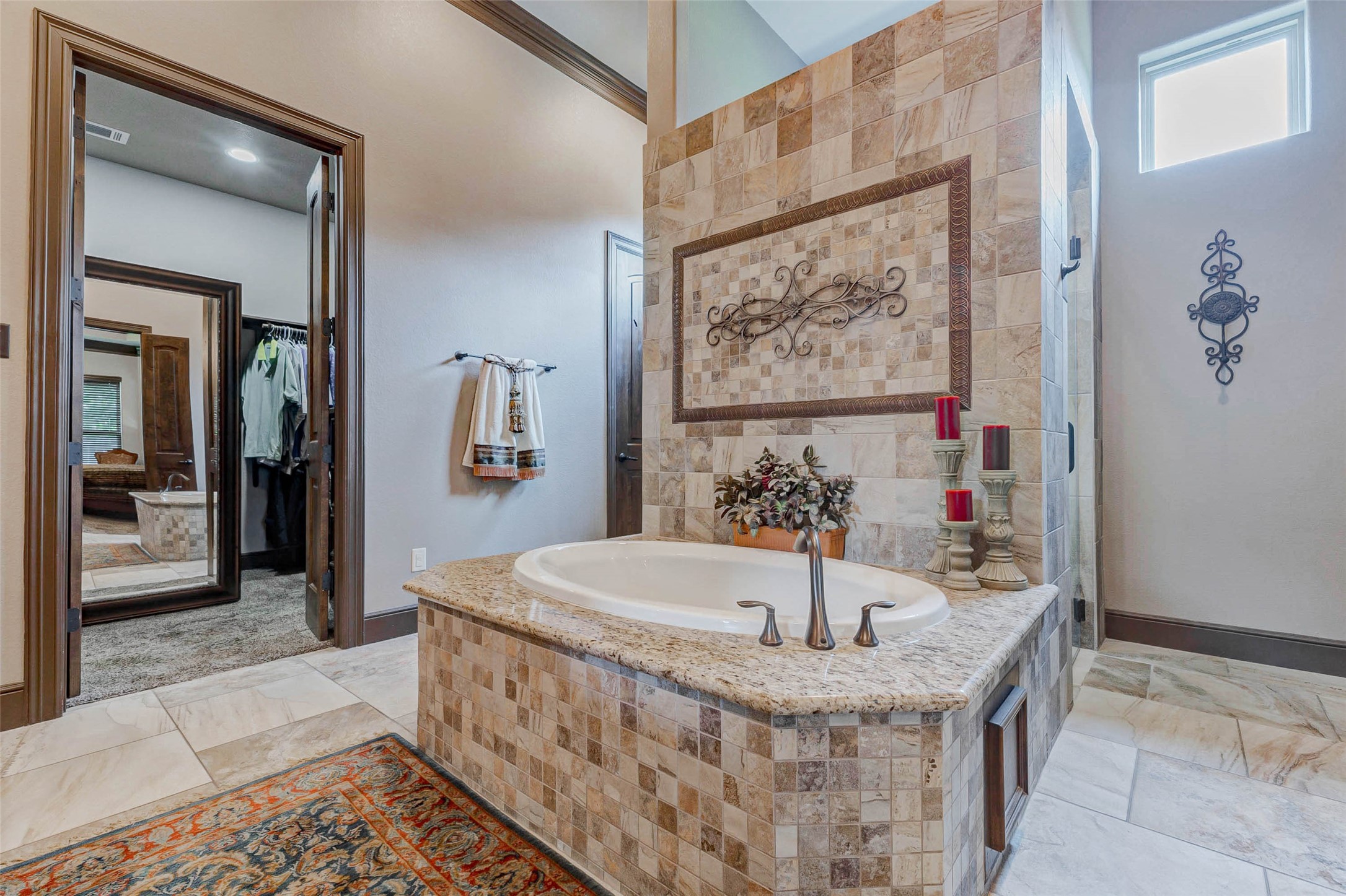 4315 Wickby Street Fulshear, TX 77441 - Photo 34 of 46 a bath tub sitting next to a bathroom sink