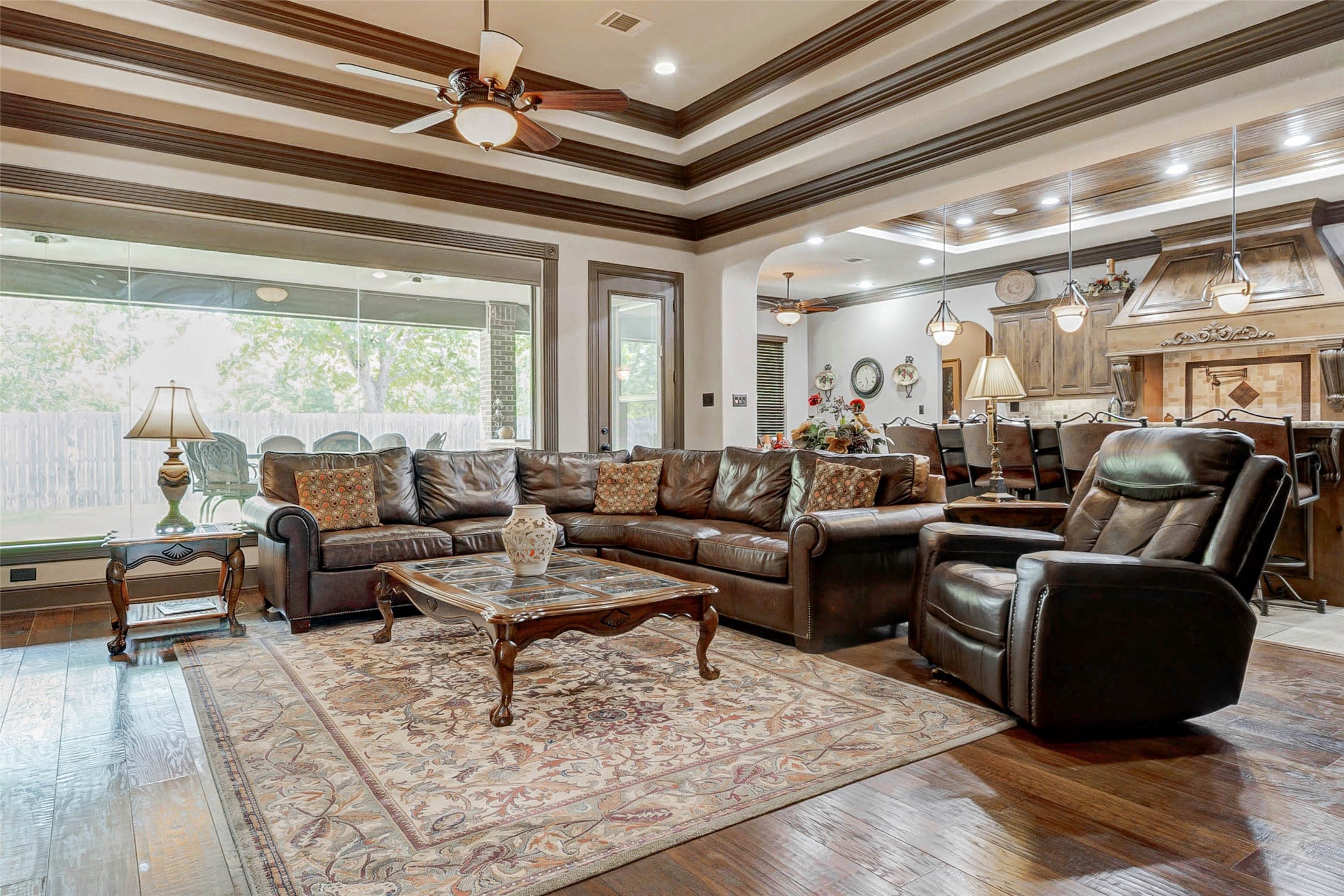 4315 Wickby Street Fulshear, TX 77441 - Photo 8 of 46 a living room with furniture and a large window