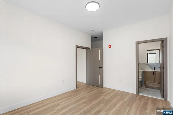 a view of livingroom with furniture and wooden floor