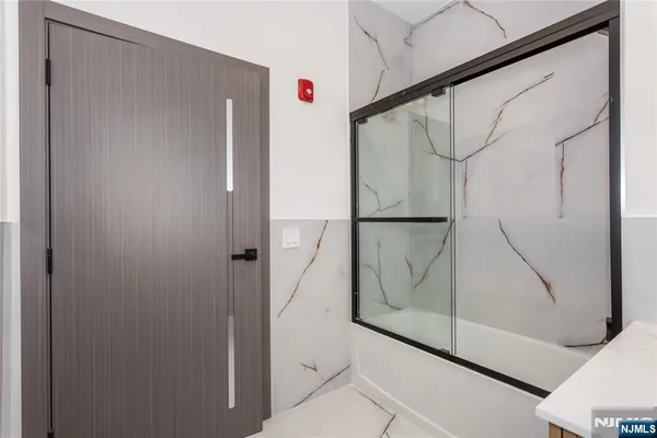 a view of a balcony with wooden floor