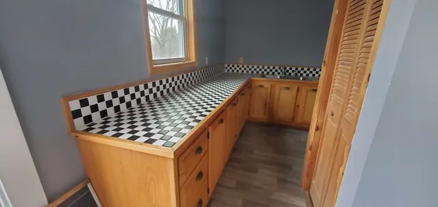 a balcony view with a sink