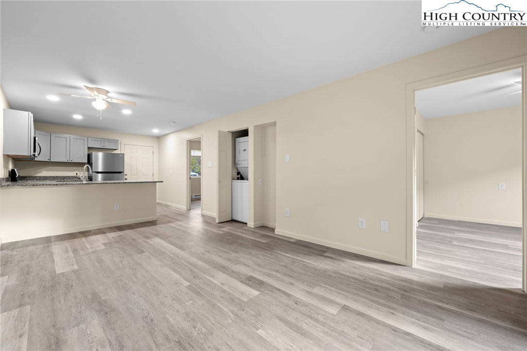 128 Zeb Street, Unit A101 Boone, NC 28607 - Photo 6 of 32 a view of a kitchen with wooden floor