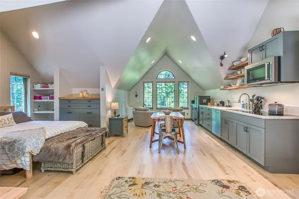 a bedroom with a bed and furniture
