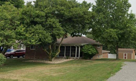 3740 Tuscarawas Road Beaver, PA 15009 - Photo 1 of 1 a front view of a house with a garden