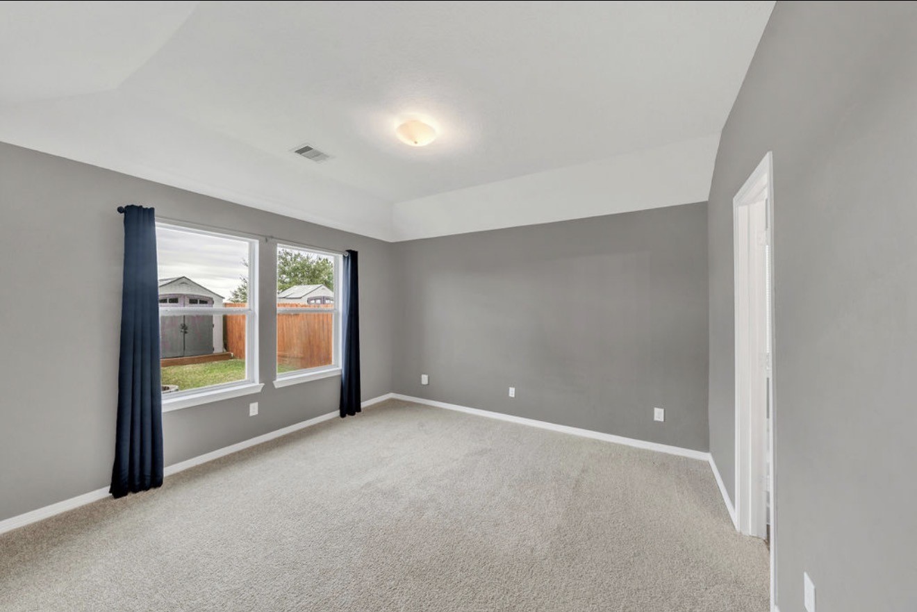 9807 Onyx Trail Drive Rosharon, TX 77583 - Photo 11 of 24 a view of an empty room with a window