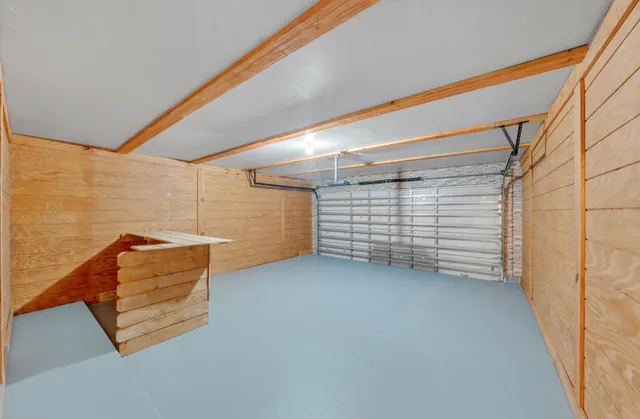 a view of an empty room and windows