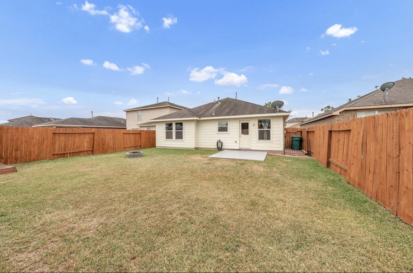 9807 Onyx Trail Drive Rosharon, TX 77583 - Photo 24 of 24 a house with yard in front of it