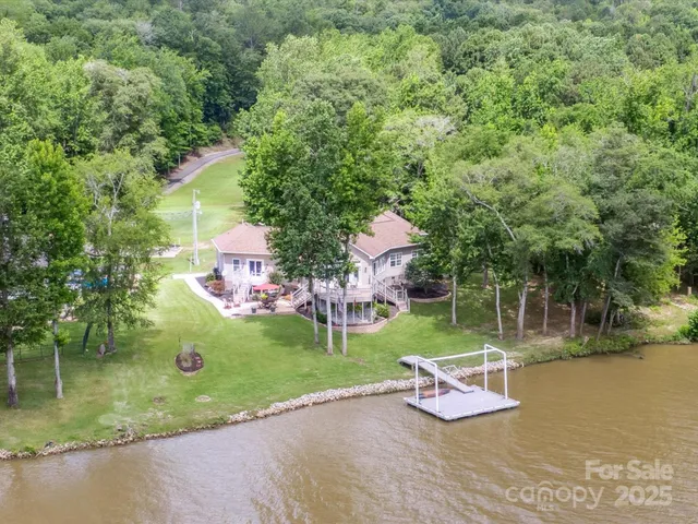 a view of a lake with a house