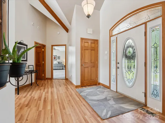 a view of livingroom with furniture and floor to ceiling window
