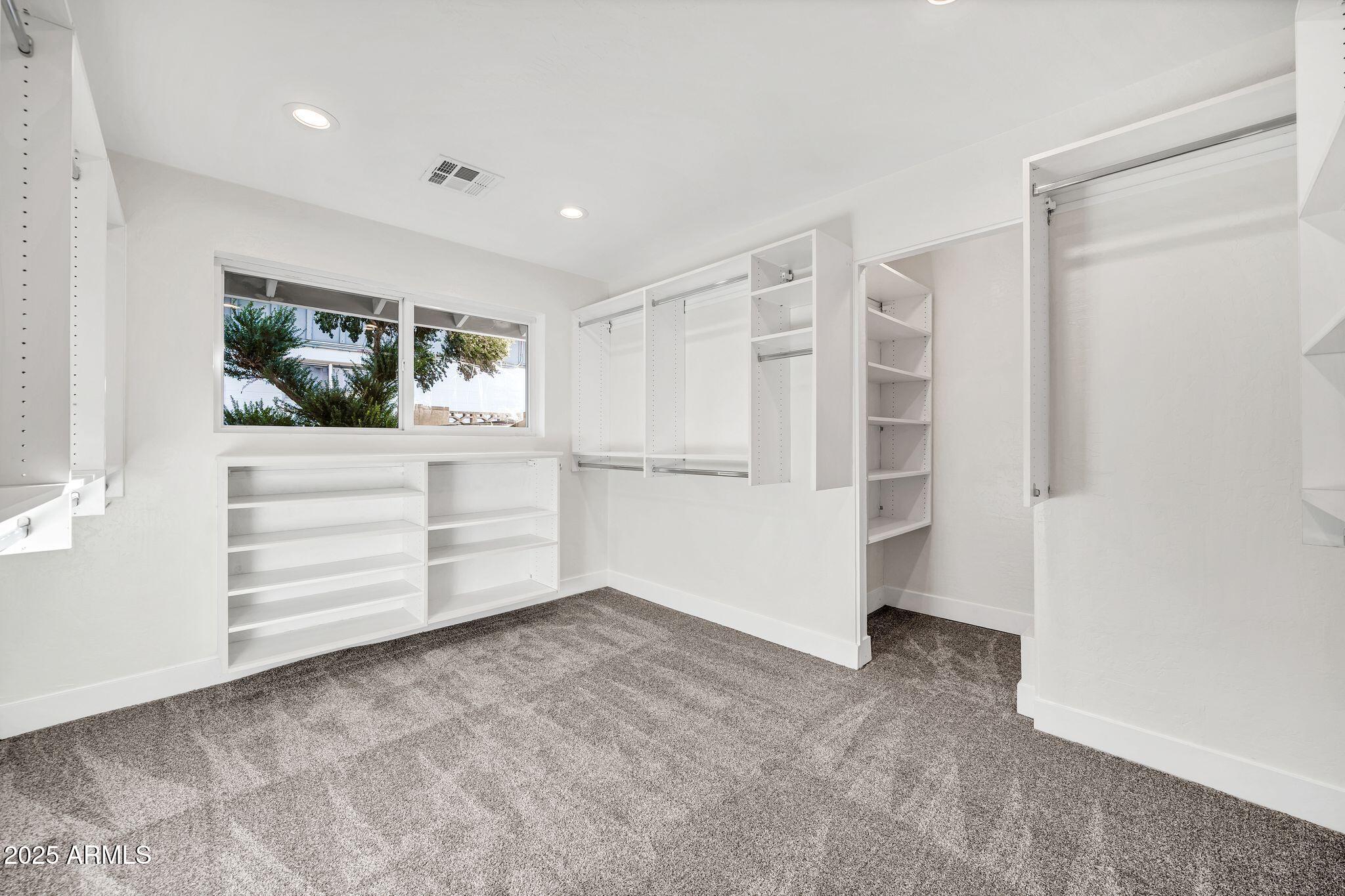 641 West Linger Lane Phoenix, AZ 85021 - Photo 17 of 38 a view of walk in closet with cabinet