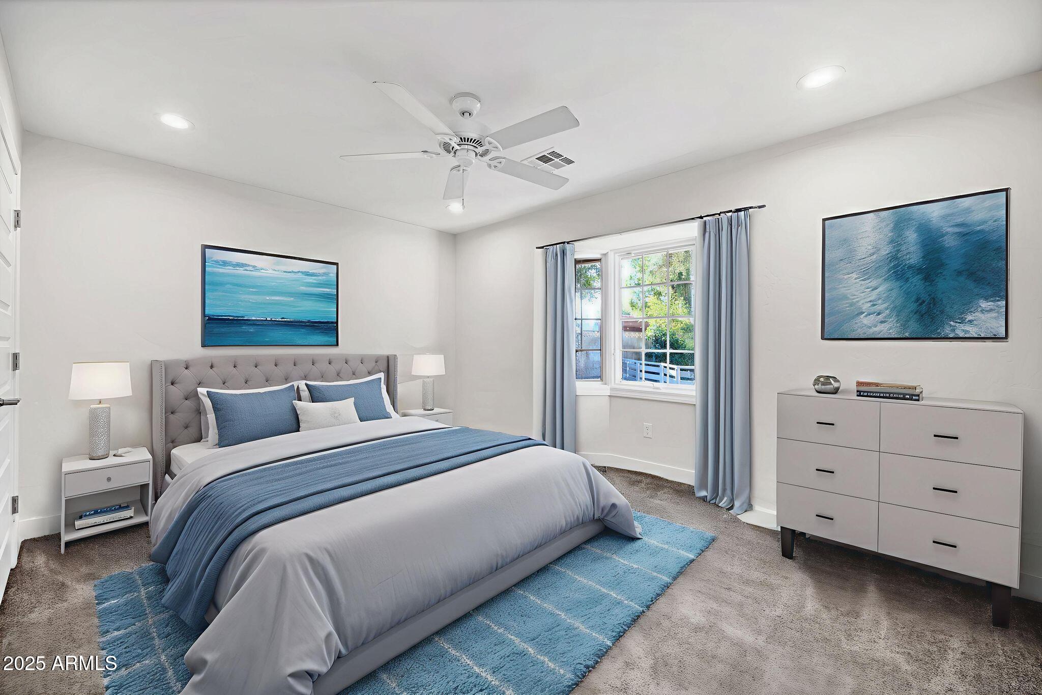 641 West Linger Lane Phoenix, AZ 85021 - Photo 24 of 38 a bedroom with a bed and a window