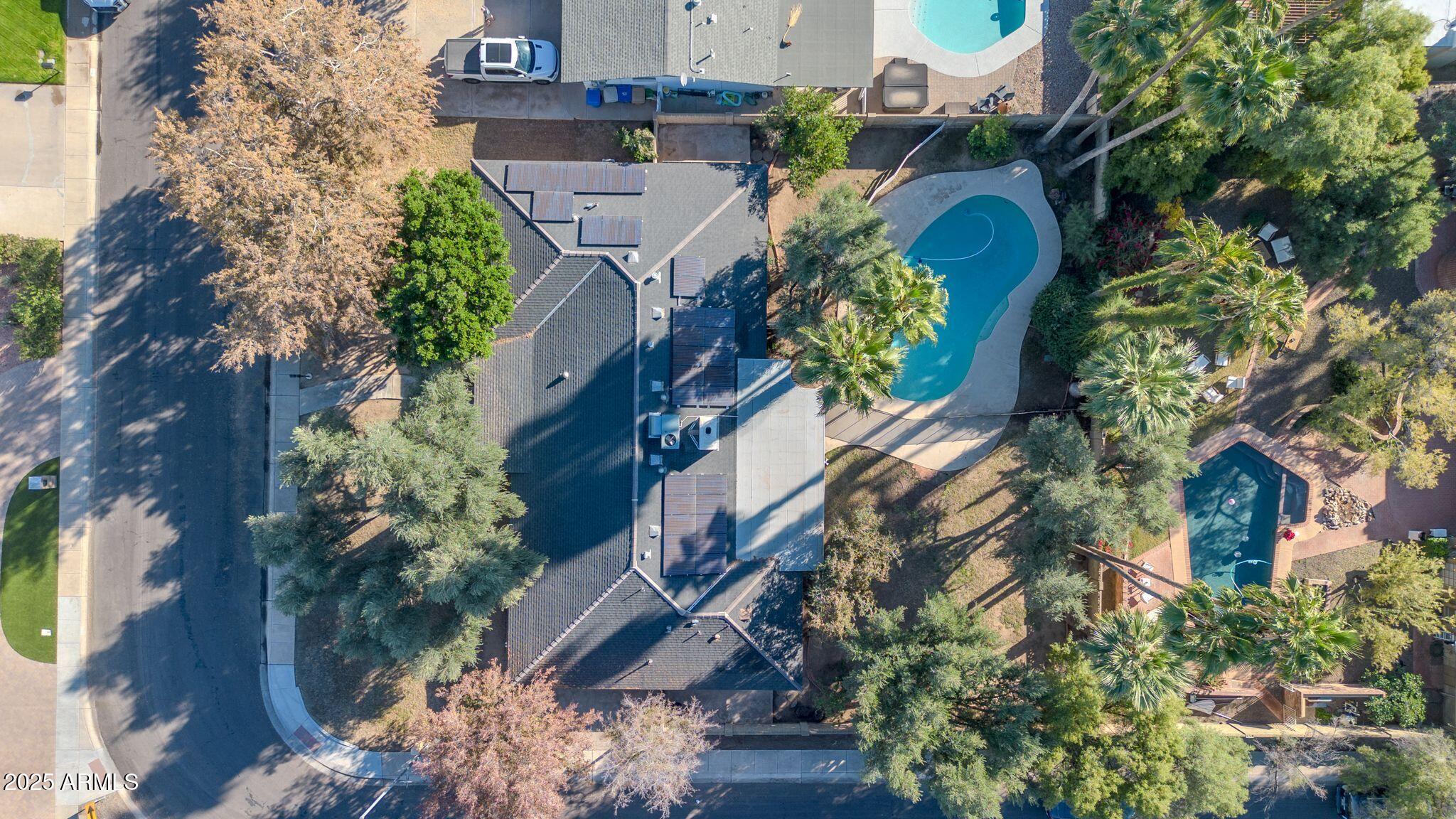 641 West Linger Lane Phoenix, AZ 85021 - Photo 37 of 38 an aerial view of a house with a yard and sitting area